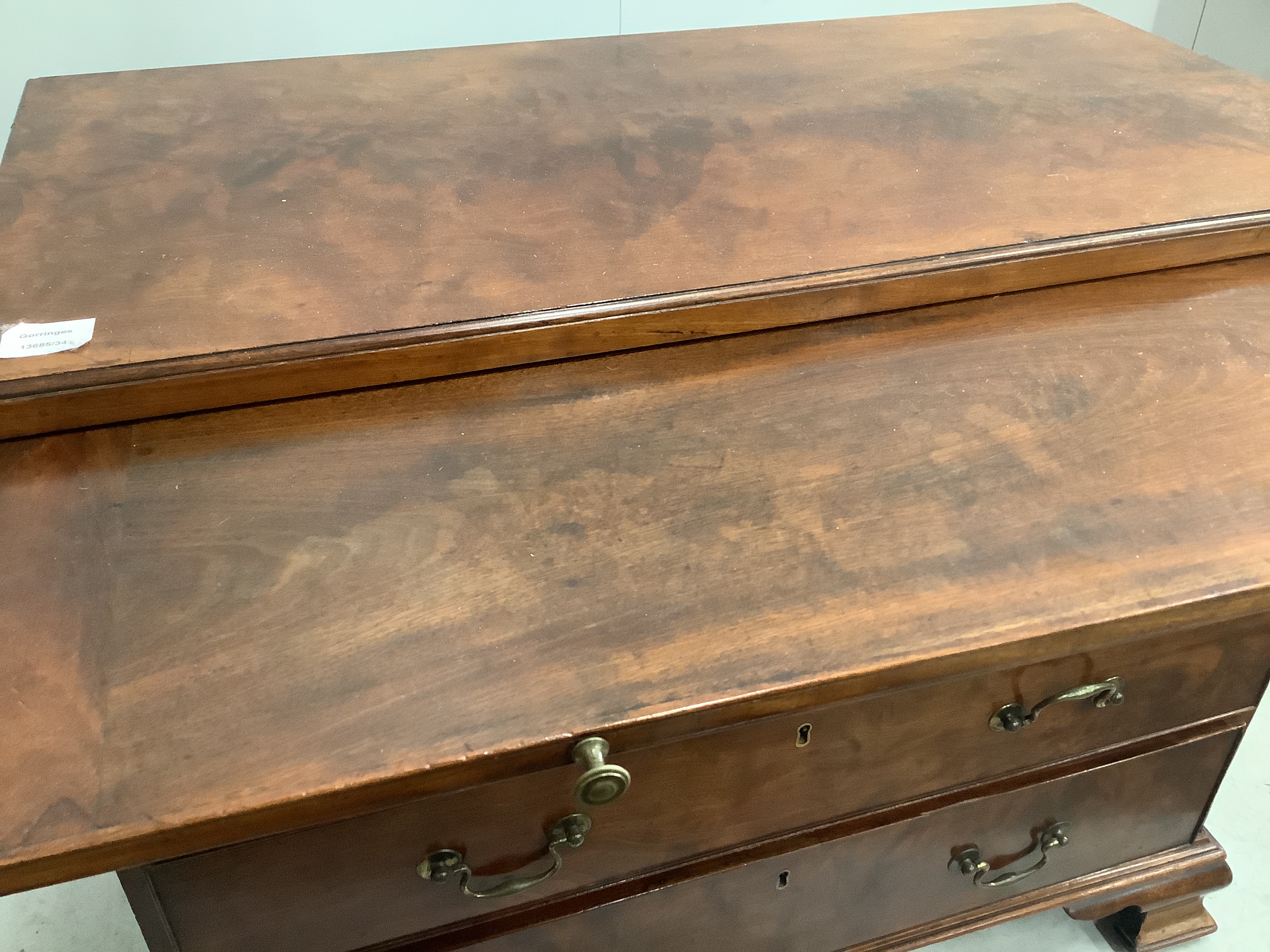 A George III mahogany four drawer chest with brushing slide, width 91cm, depth 46cm, height 80cm